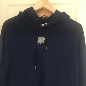 Medium Undefeated navy blue hoodie